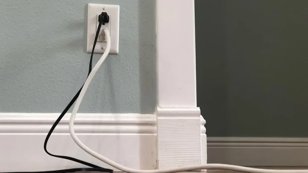 Tomada elétrica com cabos corretamente conectados